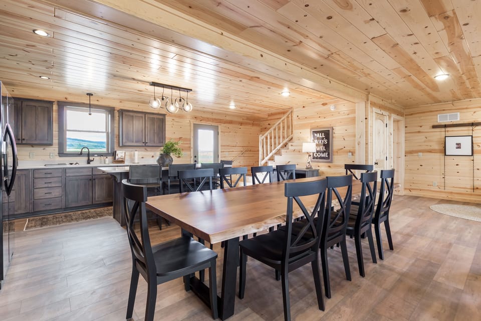 This gorgeous solid wood/live edge dining table seats 10 effortlessly!