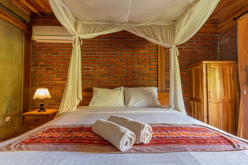 Deluxe Room, Pool View | 1 bedroom, desk, free WiFi, bed sheets
