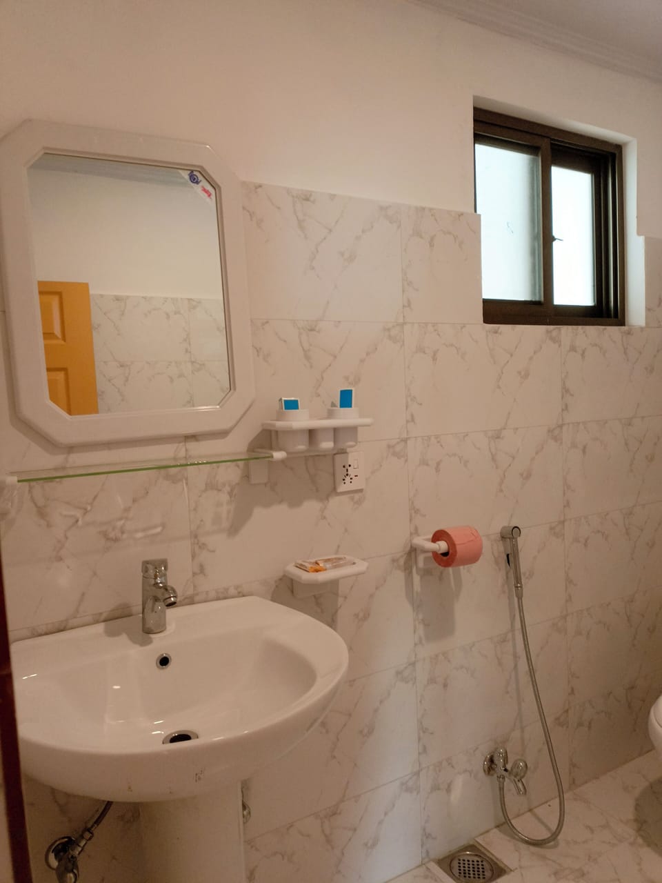 Shower, slippers, towels, soap