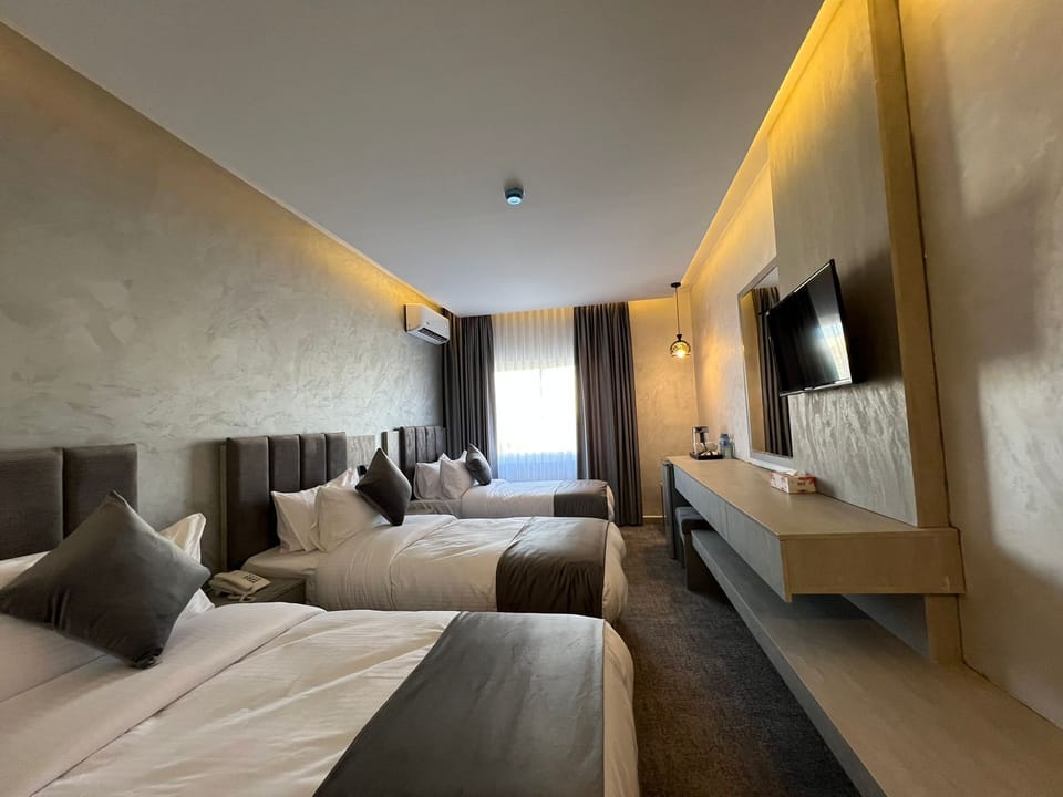 Superior Triple Room | Hypo-allergenic bedding available, minibar, in-room safe, desk