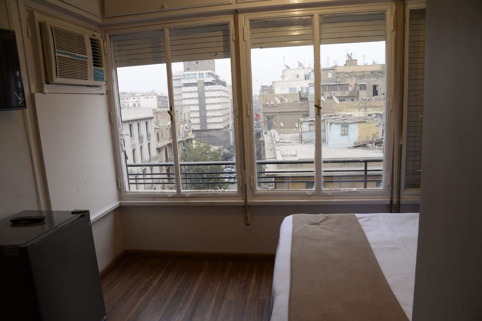 Basic Single Room, Non Smoking | 1 bedroom, premium bedding, minibar, in-room safe