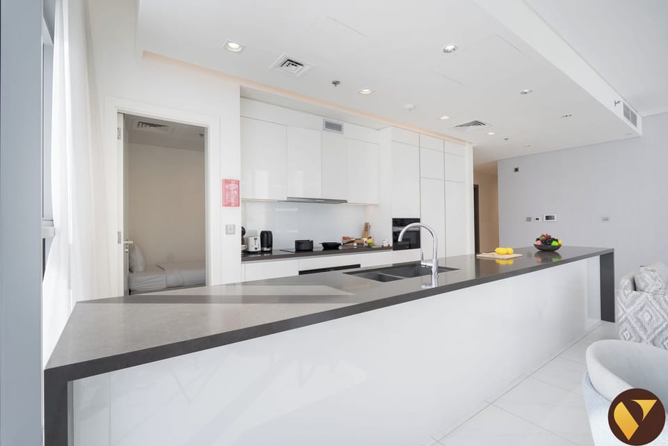 Luxury Apartment | Private kitchen | Full-size fridge, microwave, oven, stovetop