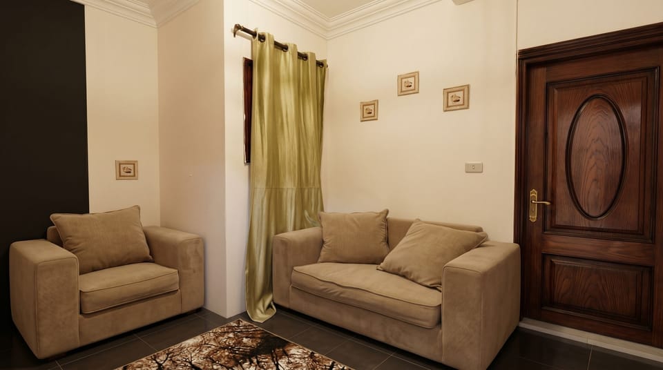 Royal Triple Room, Multiple Beds, Smoking, Mountain View | Living area | 32-cm LED TV with satellite channels, toys, books
