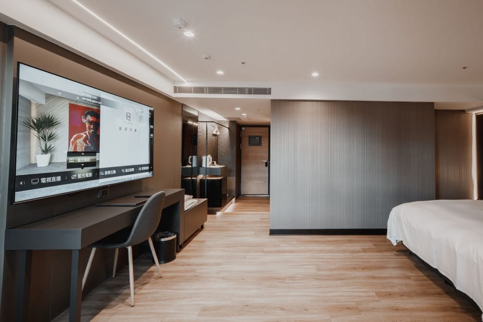 Down comforters, desk, blackout drapes, soundproofing