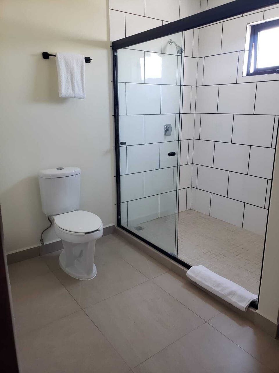 Luxury Studio Suite, 1 King Bed | Bathroom | Shower, hair dryer