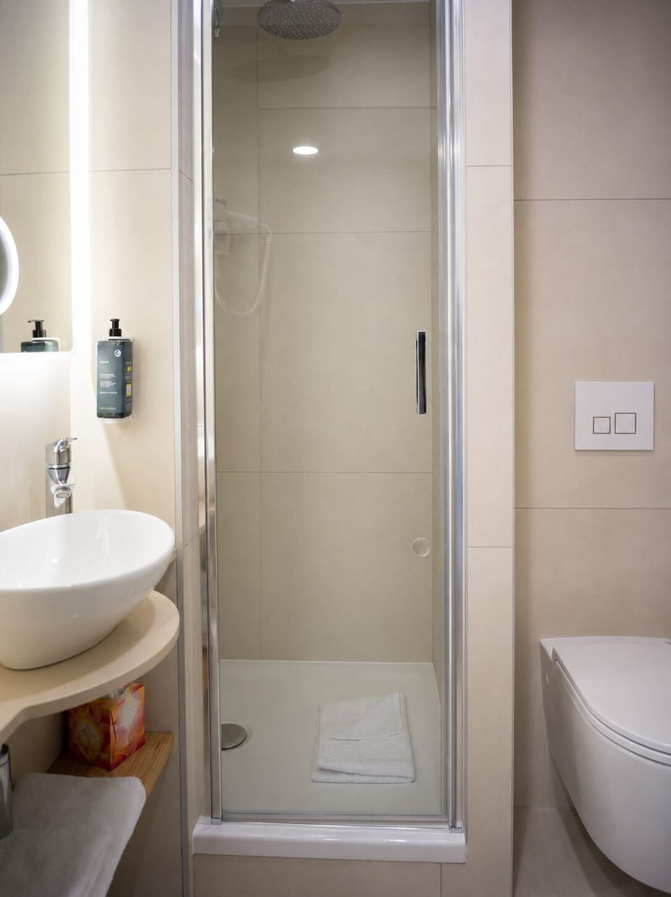 Shower, free toiletries, hair dryer, towels