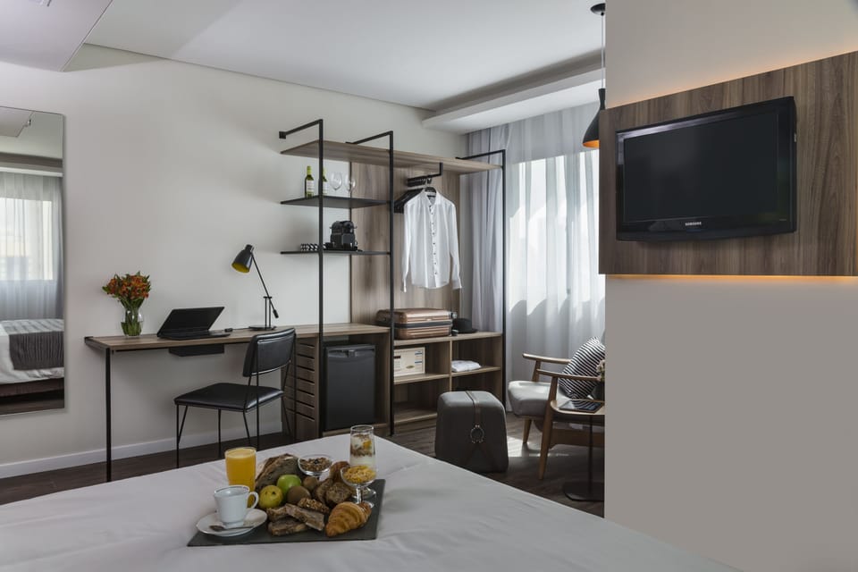Premium Double Room, 1 Queen Bed | Minibar, in-room safe, desk, laptop workspace