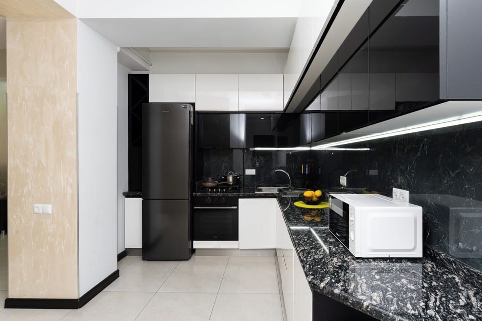 Family Apartment | Private kitchen | Fridge, stovetop, electric kettle, griddle