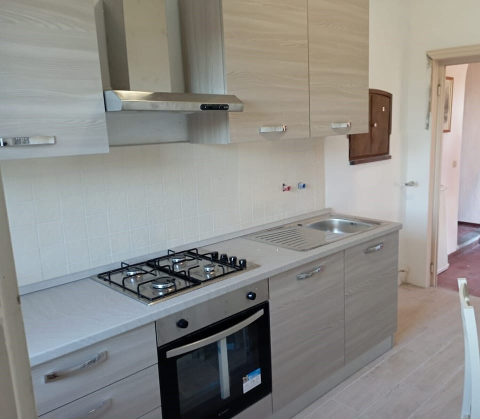 Apartment | Private kitchen | Full-size fridge, oven, stovetop, cookware/dishes/utensils