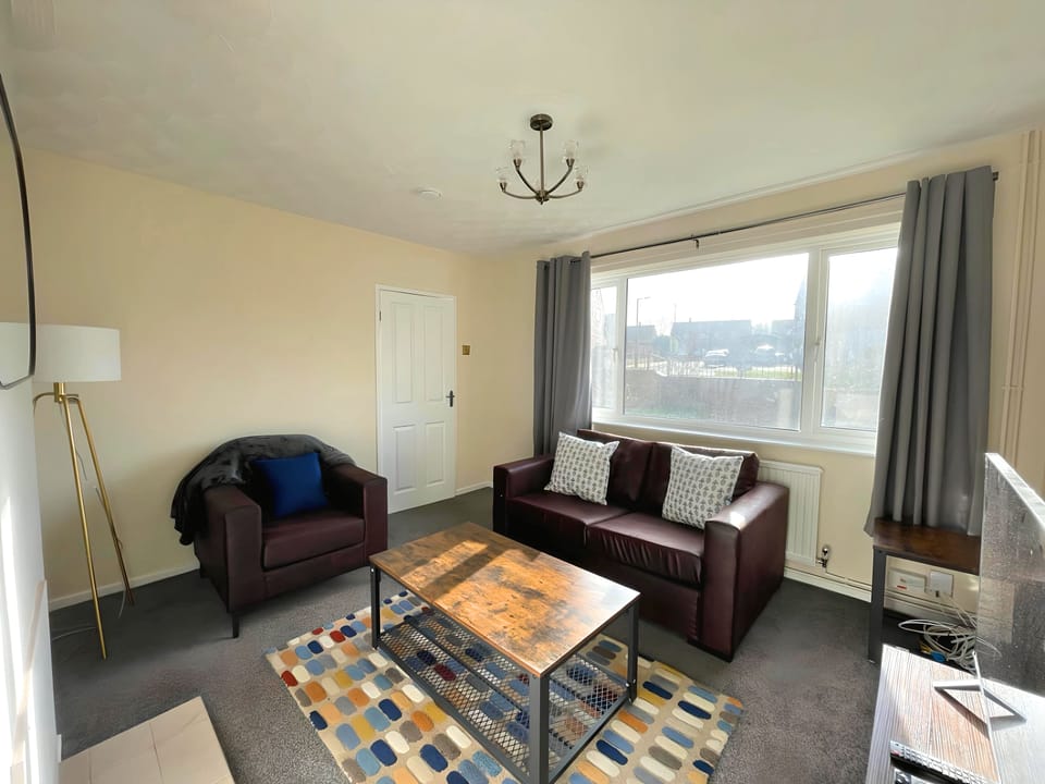 Comfort House | Living area | 40-inch LCD TV with cable channels