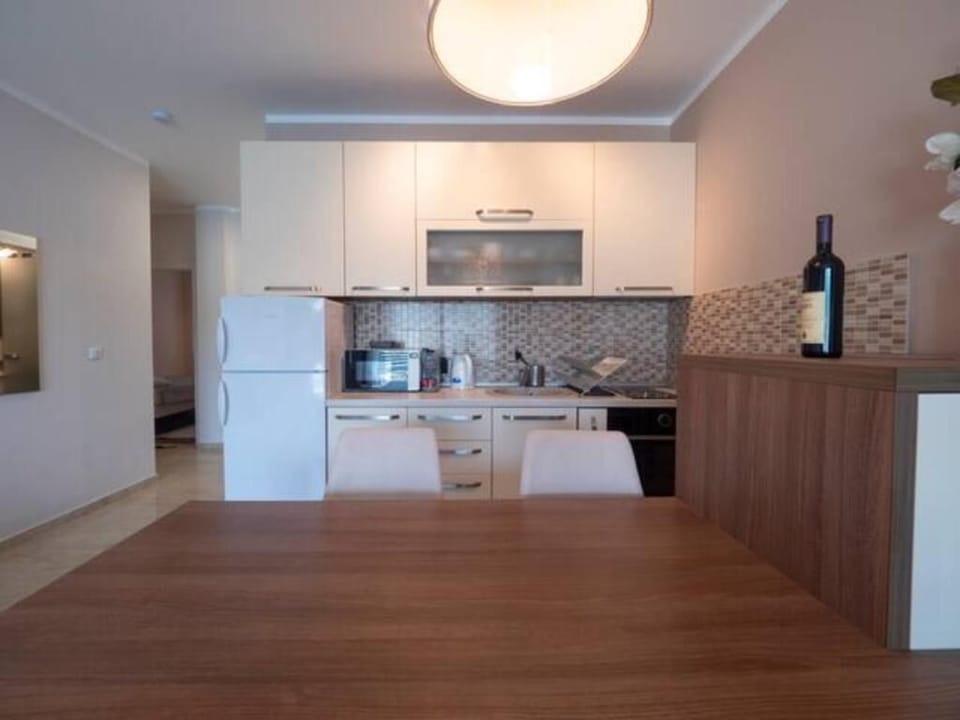 Panoramic Apartment | Private kitchen | Fridge, microwave, electric kettle, toaster
