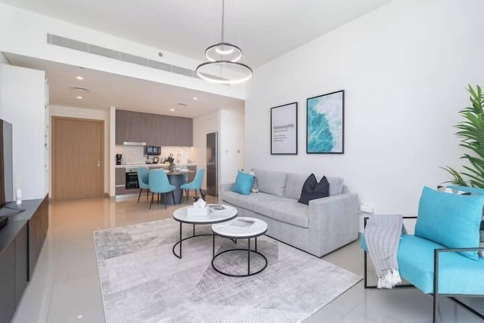 Luxury Apartment | Living area | 65-inch Smart TV with cable channels