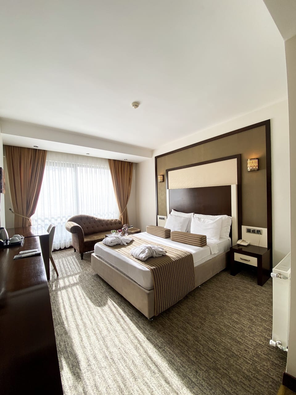 Premium bedding, down comforters, minibar, in-room safe