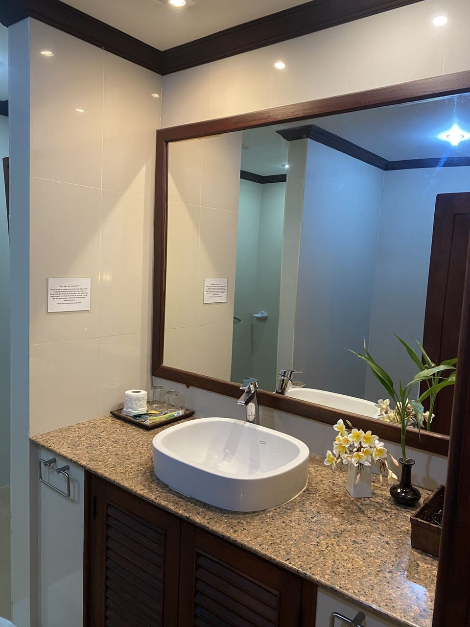 Rainfall showerhead, designer toiletries, hair dryer, slippers