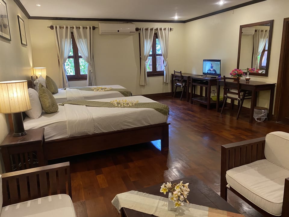 Deluxe Triple Room | Premium bedding, minibar, in-room safe, individually decorated