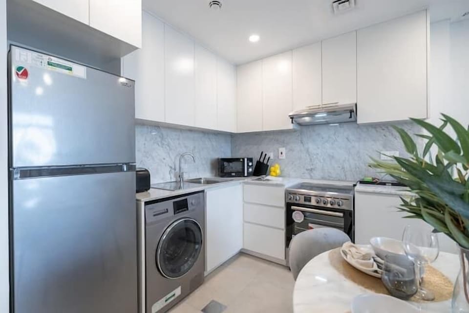 Luxury Apartment | Private kitchen | Full-size fridge, microwave, oven, stovetop
