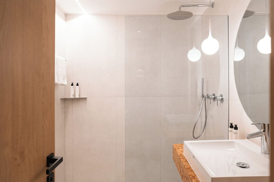 Shower, free toiletries, hair dryer, bathrobes