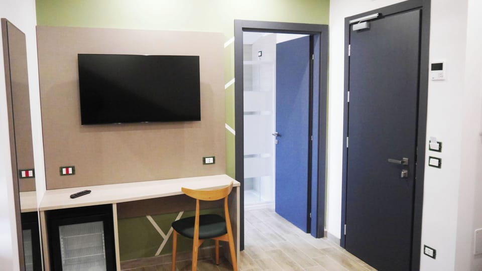 Room | Hypo-allergenic bedding, down comforters, in-room safe, desk