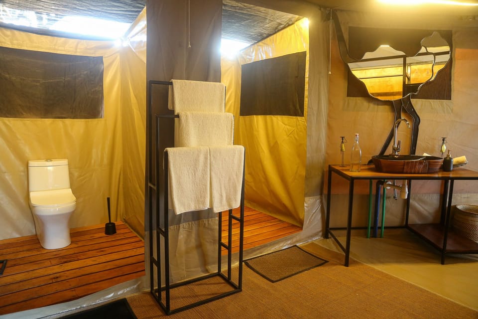 Luxury Triple Room | Bathroom | Hair dryer, bathrobes, towels