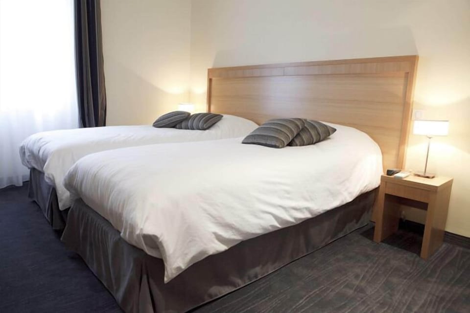 	Superior Room, 2 Twin Beds, Private Entrance | In-room safe, desk, iron/ironing board, free WiFi