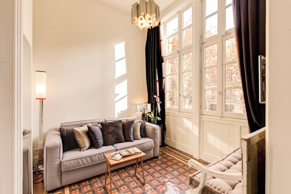 Junior Suite, City View | Minibar, in-room safe, desk, blackout drapes