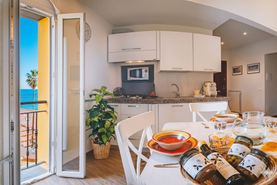 Basic Apartment | Private kitchen | Full-size fridge, microwave, stovetop, electric kettle