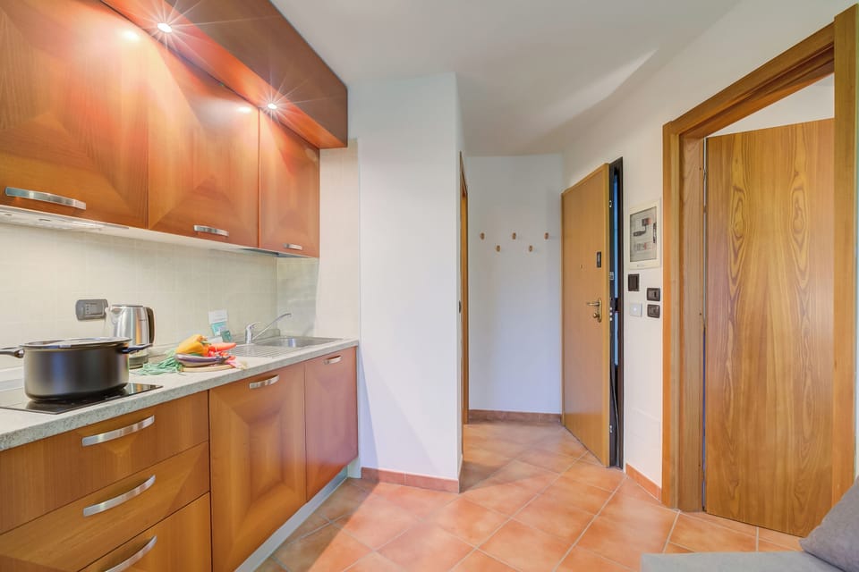 Family Apartment, Multiple Bedrooms (L' Aquila Campo Smith On The Ski) | Private kitchen | Fridge, stovetop, electric kettle, cookware/dishes/utensils