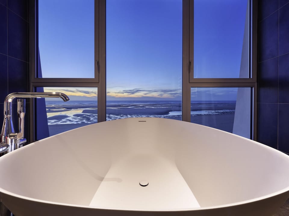 Free minibar items, in-room safe, desk, blackout drapes