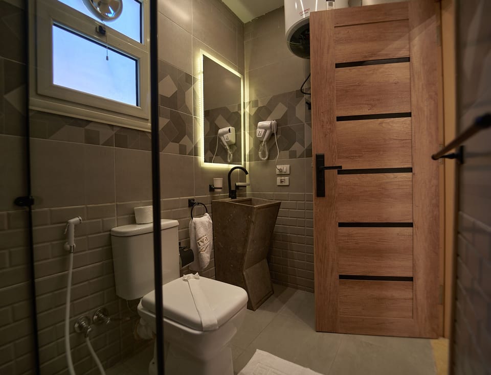 Shower, free toiletries, hair dryer, bathrobes