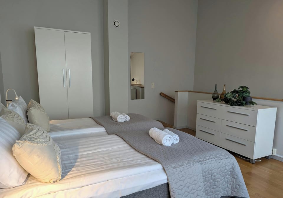 Apartment, 1 Bedroom | 1 bedroom, desk, blackout drapes, iron/ironing board
