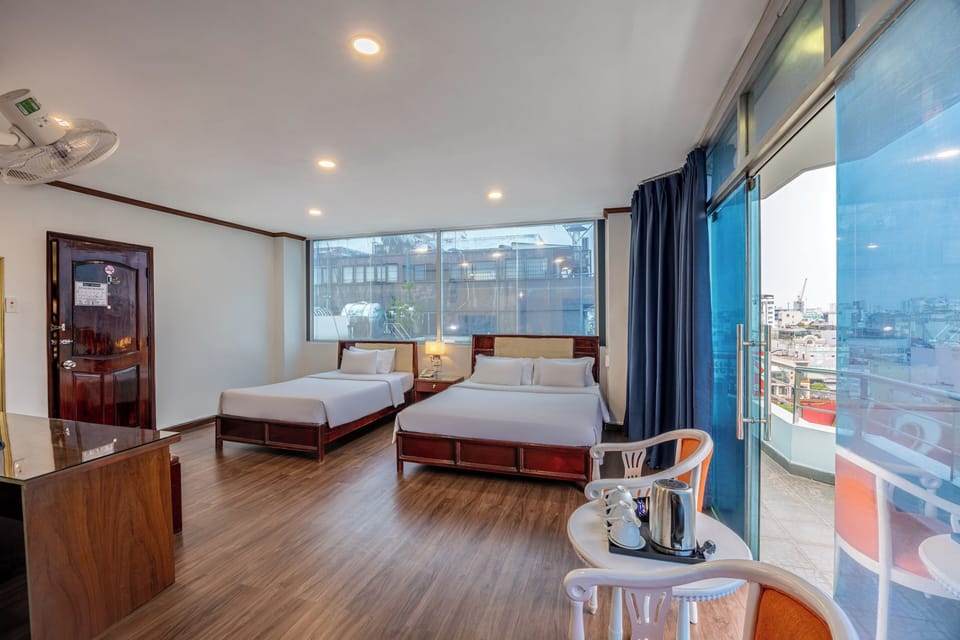 Family Room, 1 Bedroom, Air conditioning | Minibar, in-room safe, desk, blackout drapes