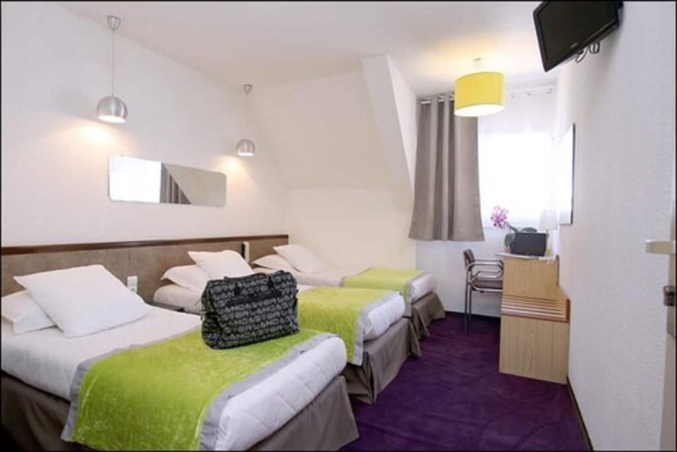 Triple Room | Individually decorated, individually furnished, blackout drapes