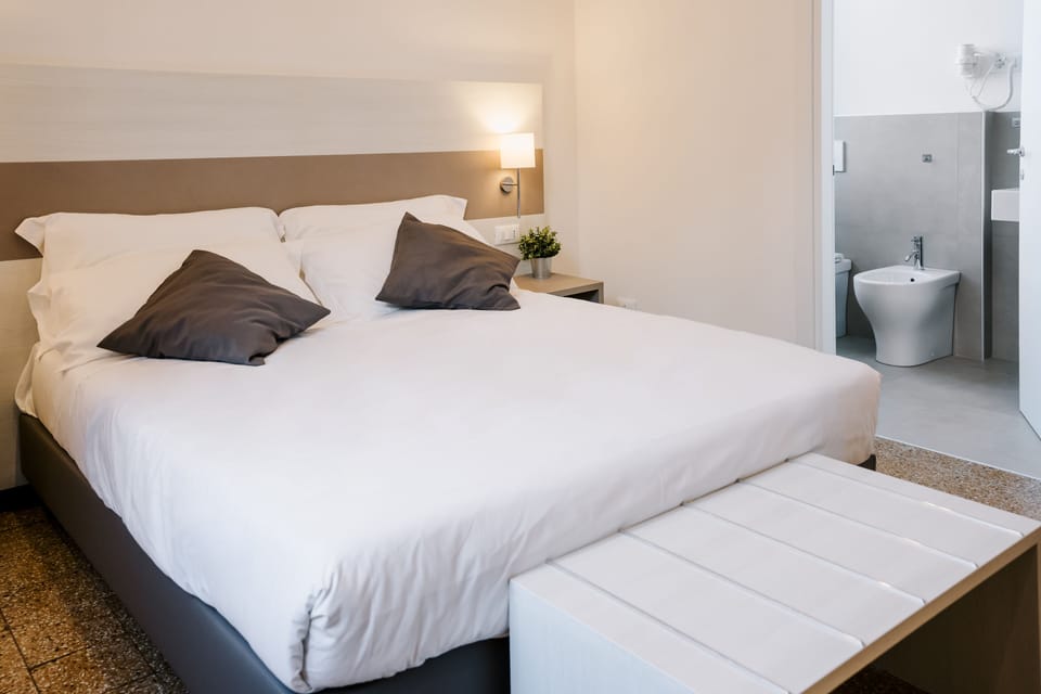 Superior Double or Twin Room | Minibar, in-room safe, desk, laptop workspace