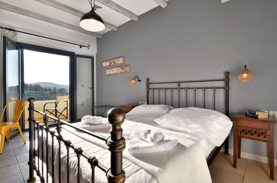 Apartment, 1 Bedroom, Sea View | 1 bedroom, in-room safe, desk, soundproofing
