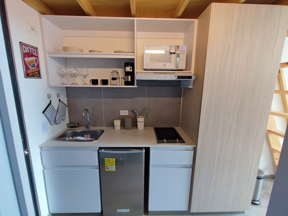 Apartment | Private kitchen | Mini-fridge, microwave, dishwasher, coffee grinder