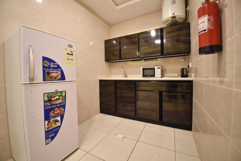 Mini-fridge, microwave, griddle, cookware/dishes/utensils