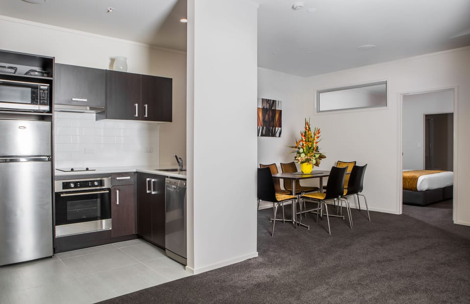 Apartment, 2 Bedrooms | Private kitchen | Fridge, microwave, stovetop, coffee/tea maker