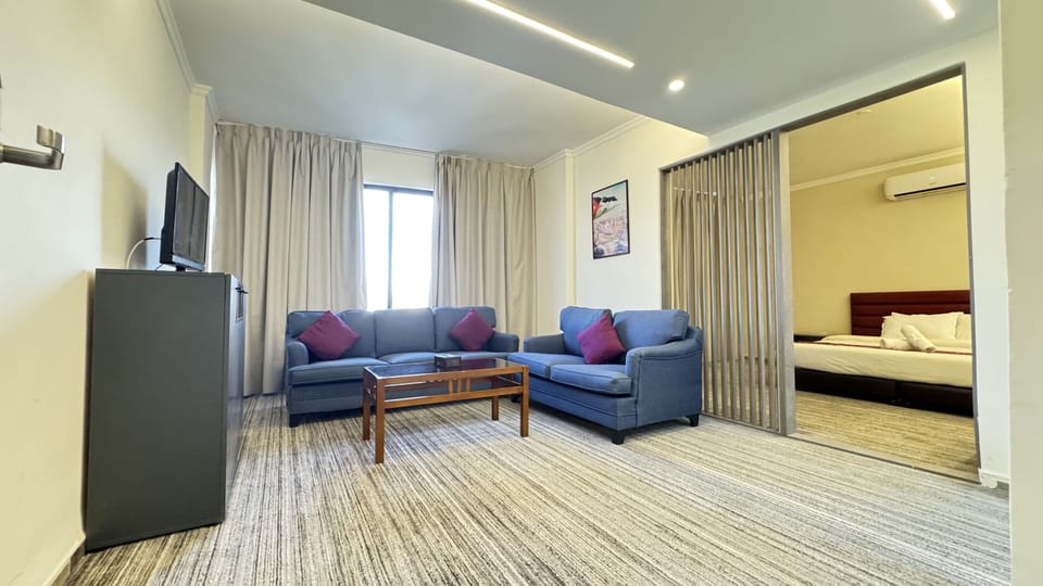 Basic Suite | Living area | 32-inch LCD TV with satellite channels, fireplace, printers