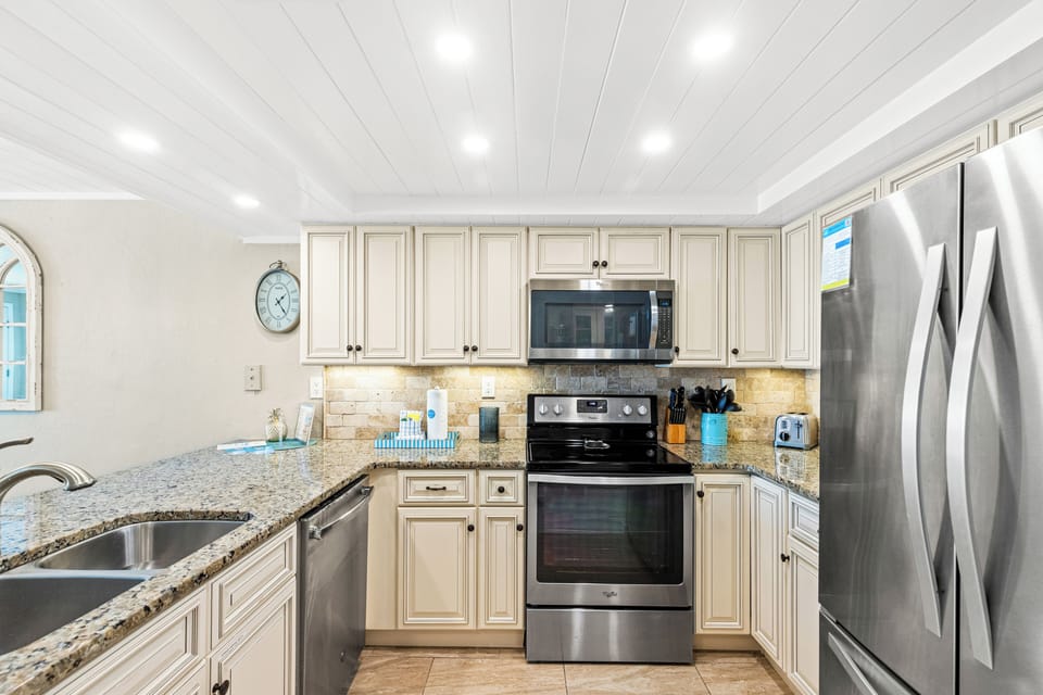 Townhome, Multiple Beds, Balcony, Ocean View (22519 Front Beach Road 150) | Private kitchen | Fridge, microwave, oven, stovetop