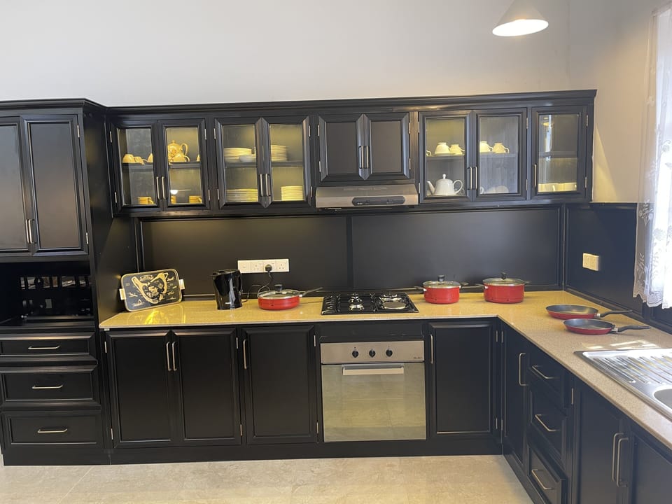 Classic Room, 1 Bedroom | Shared kitchen | Full-size fridge, microwave, oven, toaster