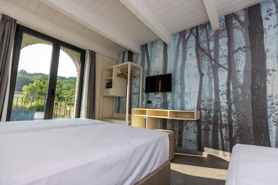 Premium bedding, down comforters, in-room safe, desk