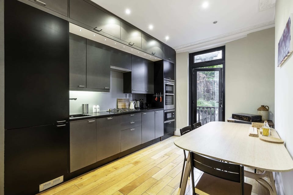 Apartment | Private kitchen | Freezer, dining tables