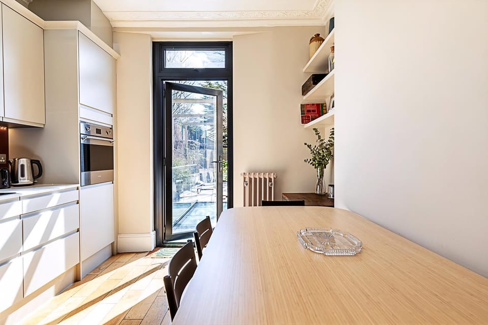 Apartment | Private kitchen | Freezer, dining tables