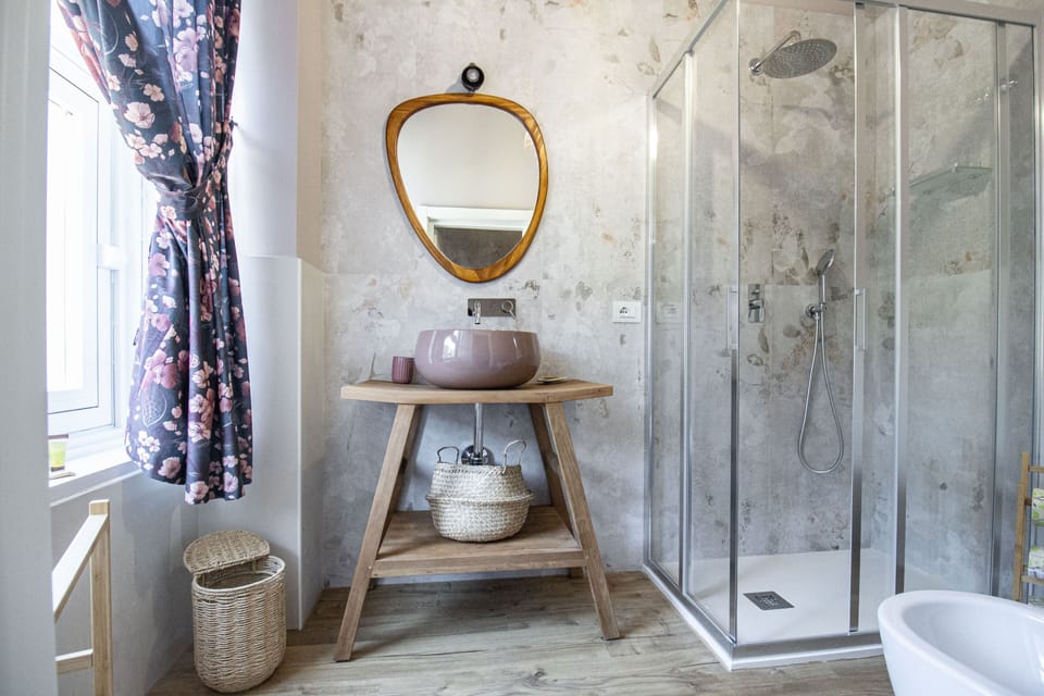 Double Room | Bathroom | Shower, rainfall showerhead, hair dryer, bathrobes