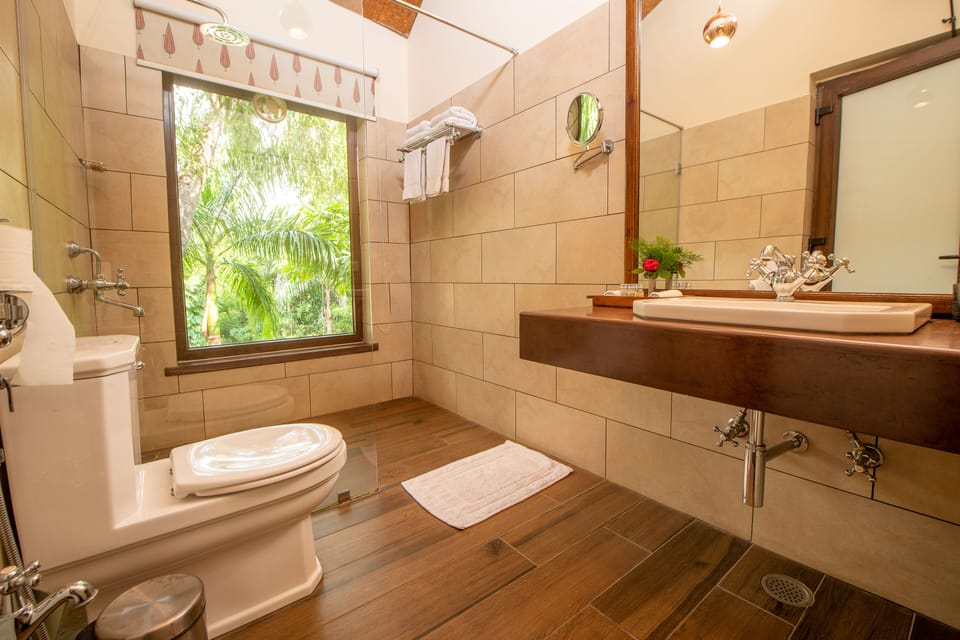 Deluxe Double Room, Mountain View | Bathroom | Shower, rainfall showerhead, bidet, towels