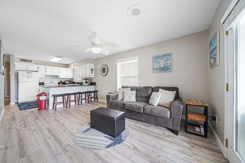 Comfort Duplex, 3 Bedrooms, Balcony | Living room | 55-inch TV with digital channels