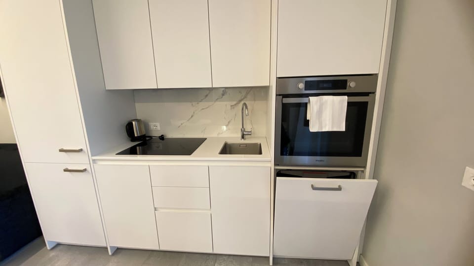 Family Condo | Private kitchenette | Full-size fridge, oven, stovetop, dishwasher