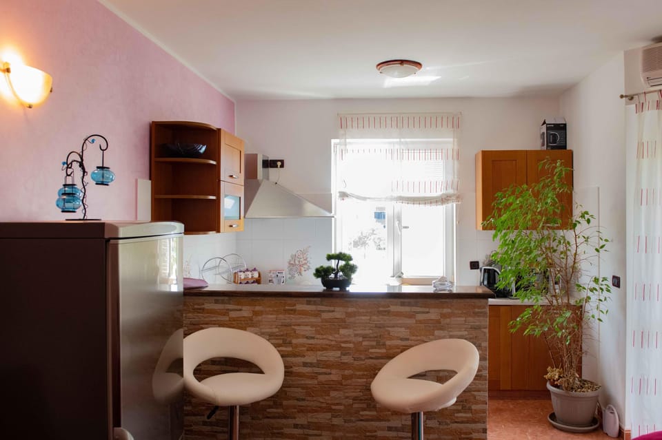 Apartment, 2 Bedrooms | Private kitchen | Full-size fridge, microwave, oven, coffee/tea maker