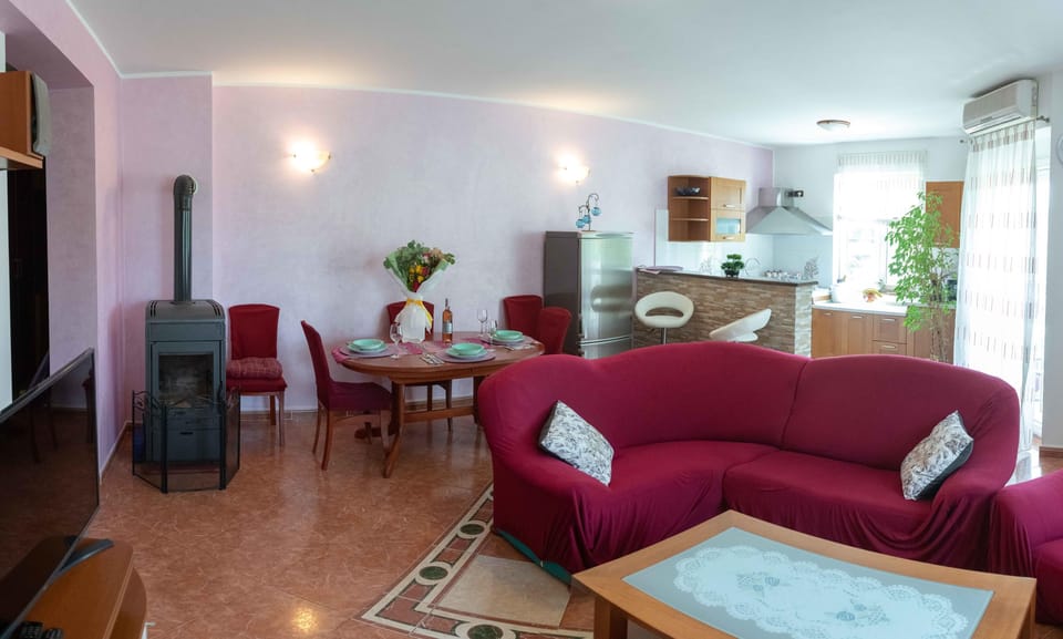 Apartment, 2 Bedrooms | Living area | 80-cm flat-screen TV with satellite channels