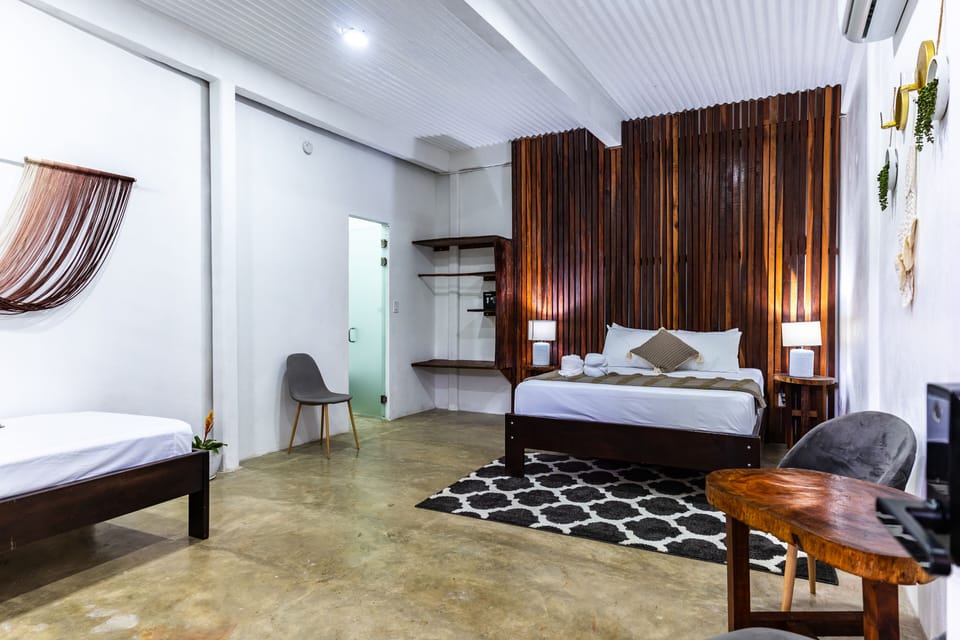 Deluxe Triple Room, Multiple Beds, Non Smoking, Courtyard Area | Premium bedding, pillowtop beds, desk, laptop workspace